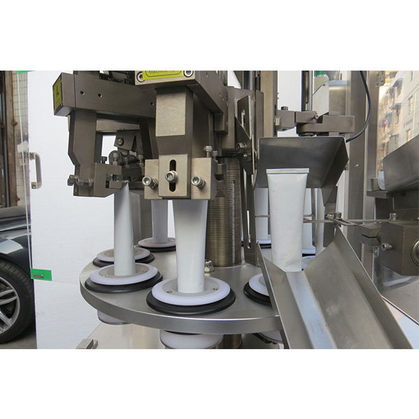 Kosmetikos vamzdžių užpildymo aparatas