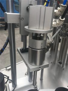 Ultragarsinis sandarinimo kosmetikos vamzdžių užpildymo aparatas